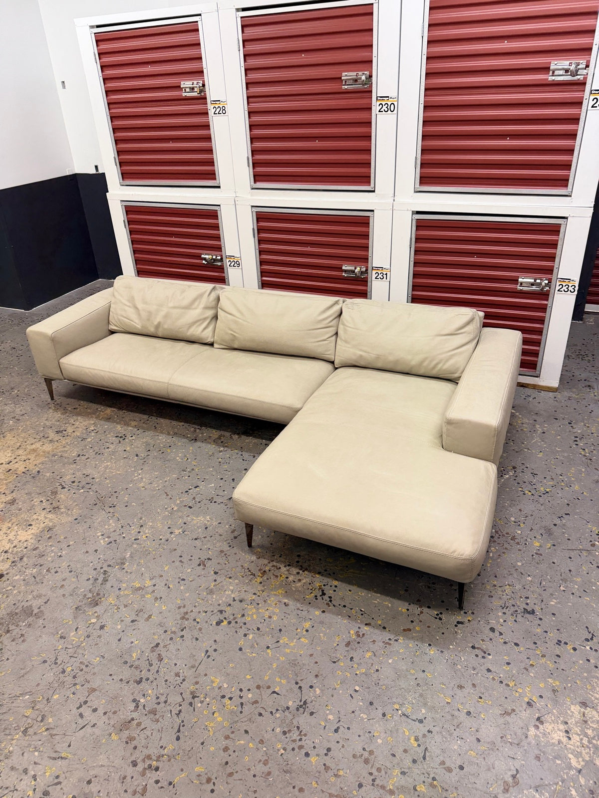 Artefacto Leather Chaise Sectional - storage view